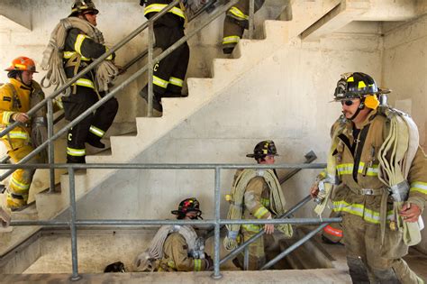 This Photo Of A Firefighter Climbing Stairs At The .